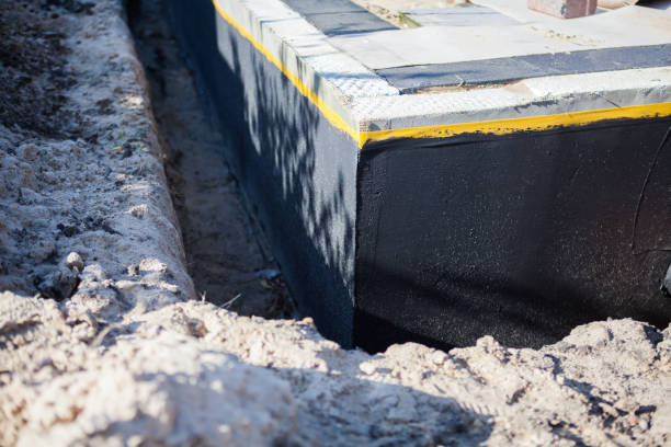 Professional Waterproofing technician working in Bancroft, MI